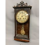 A rosewood marble faced Vienna style hanging wall clock with marble face and gilt and enamel