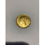 A Victorian young head gold sovereign 1880. 7.9g