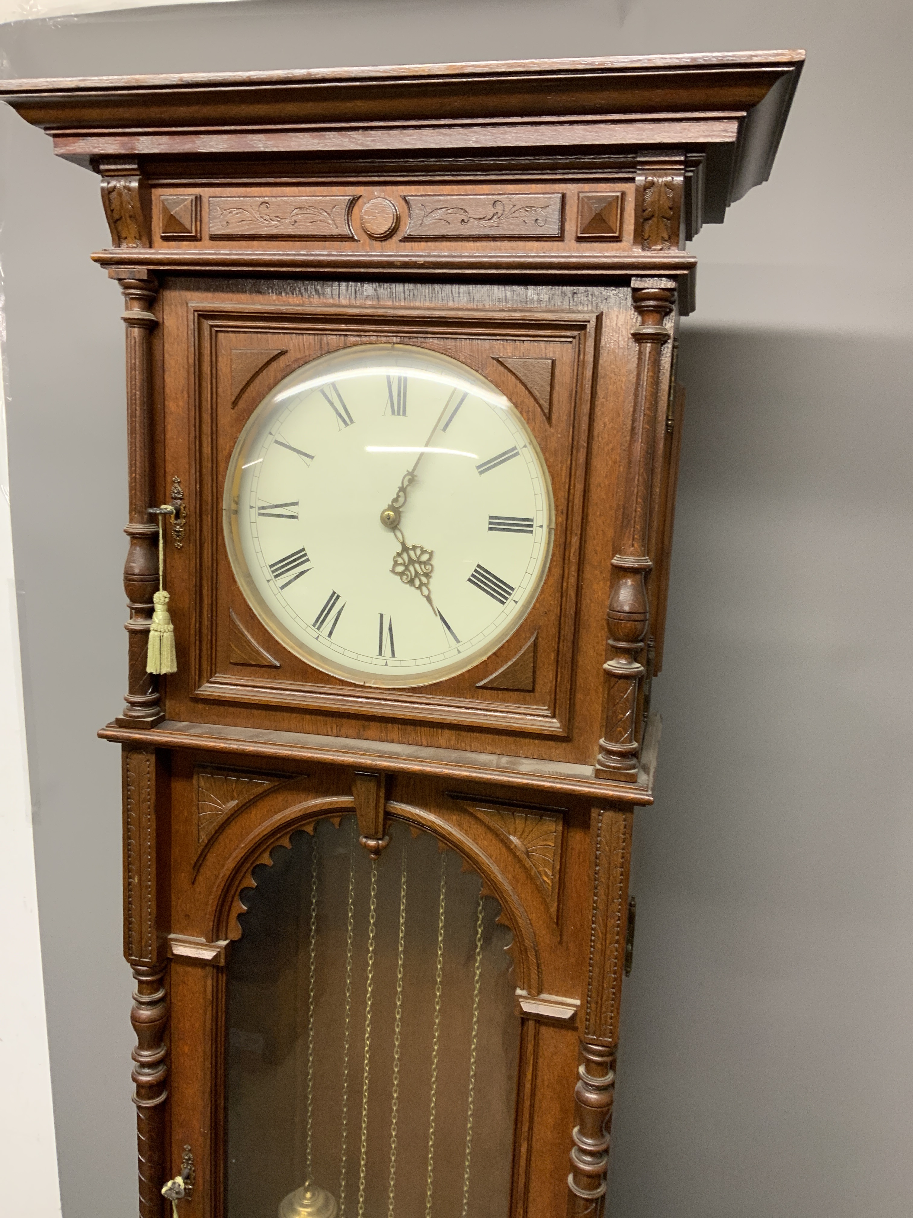 A large 20th century oak longcase clock, the case with arched glazed door. Triple weight chiming - Image 4 of 8