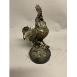 A bronze model; of a rooster on circular marble base. H:33cm