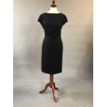 Quality silk jersey couture cocktail dress with plunging back by Guy LaRoche Paris. Waist