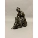A bronze figure of a seated classical lady playing a lyre. 29cm(h). Signed on harp: Habert.