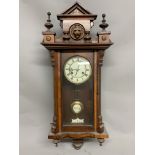 A mahogany Vienna wall clock. W:31cm x D:16cm x H:82cm