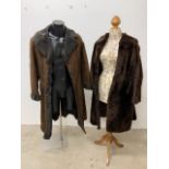 A 1950s shearling coat together with a 1970s suede and shearling long coat.