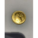 A Victorian young head gold sovereign 1882. Melbourne mint. 7.9g