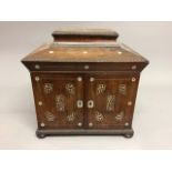 An impressive rosewood and mother of pearl inlaid sewing, writing and jewellery casket, circa