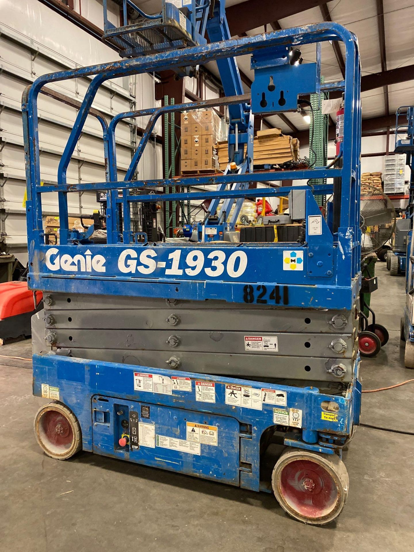 GENIE GS-1930 ELECTRIC SCISSOR LIFT, BUILT IN BATTERY CHARGER, SELF PROPELLED, 19' PLATFORM HEIGHT,