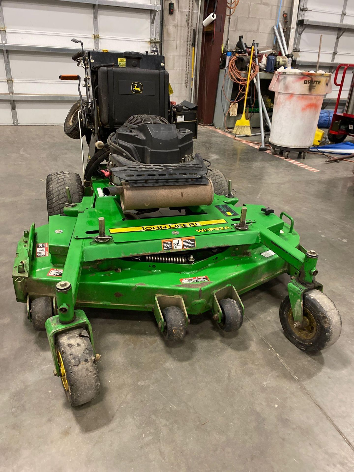 2016 JOHN DEERE WHP52A STAND ON MOWER, 1,362 HOURS SHOWING, 52" DECK, GAS POWERED, RUNS AND OPERATES