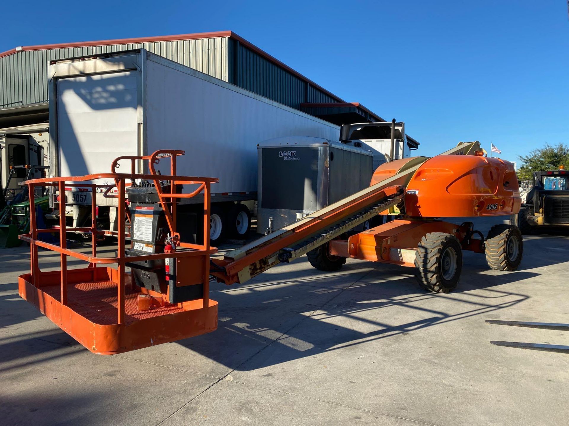 JLG 400S DIESEL MAN LIFT, 40’ REACH, FOAM FILLED TIRES, RUNS AND OPERATES