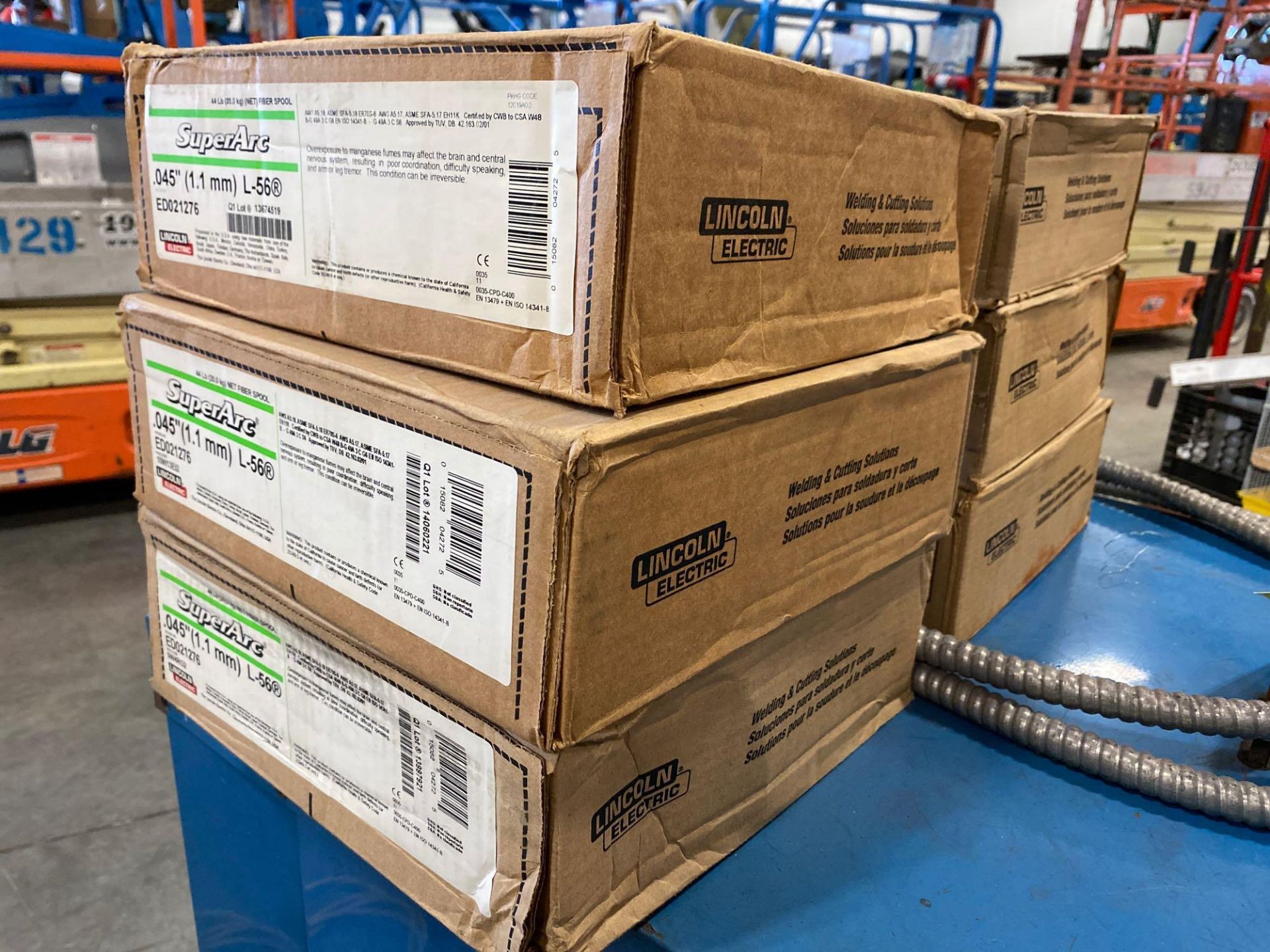 SIX NEW BOXES OF LINCOLN ELECTRIC WELDING WIRE