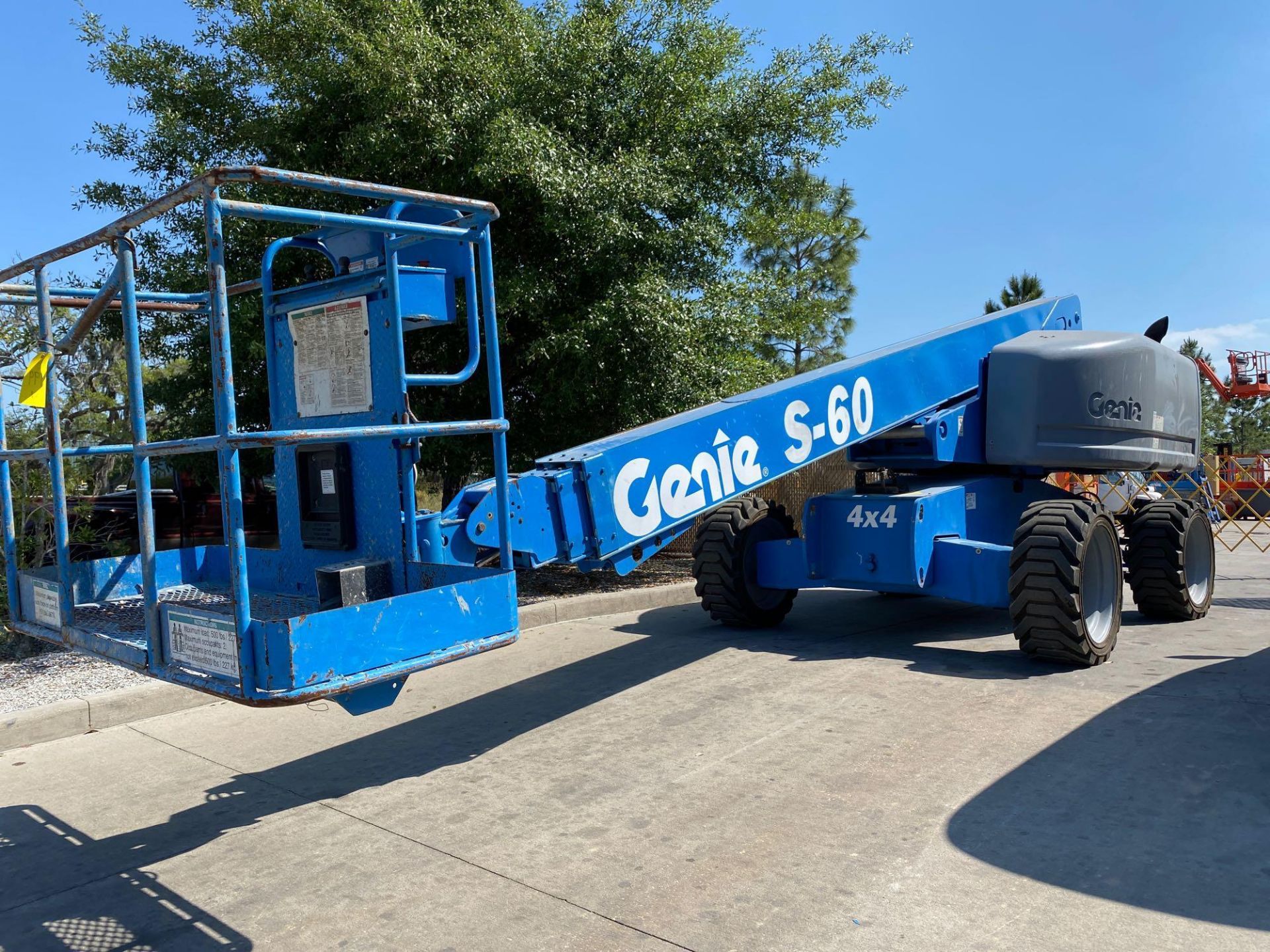 GENIE S-60 DIESEL BOOM LIFT, 4,4, 60' PLATFORM HEIGHT, 6,076 HOURS SHOWING, RUNS & OPERATES