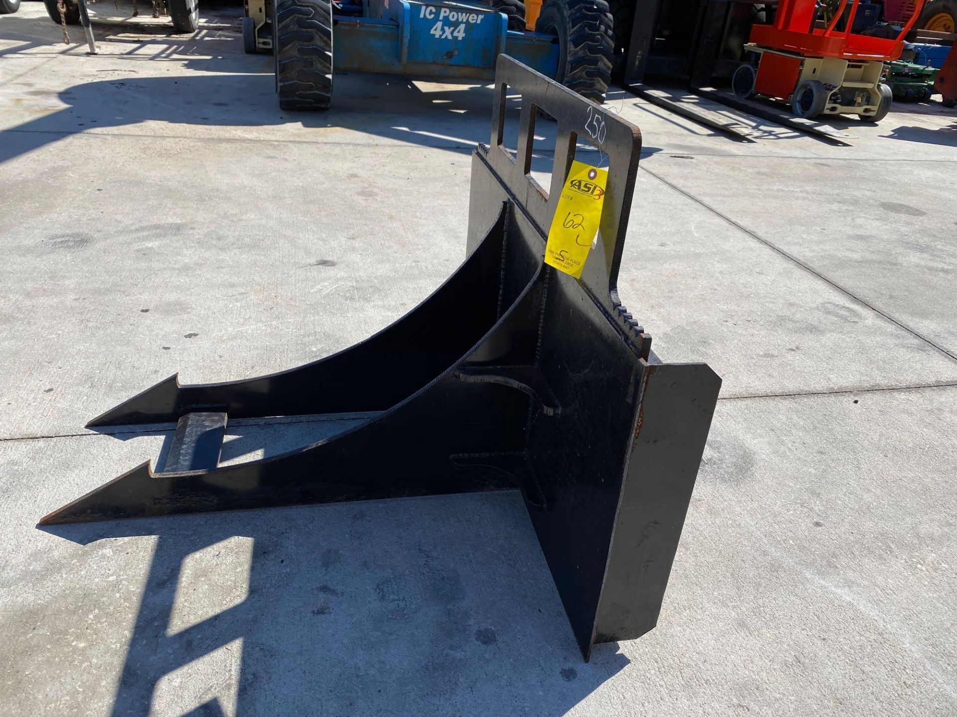 SKID STEER ROOT/STUMP REMOVER ATTACHMENT