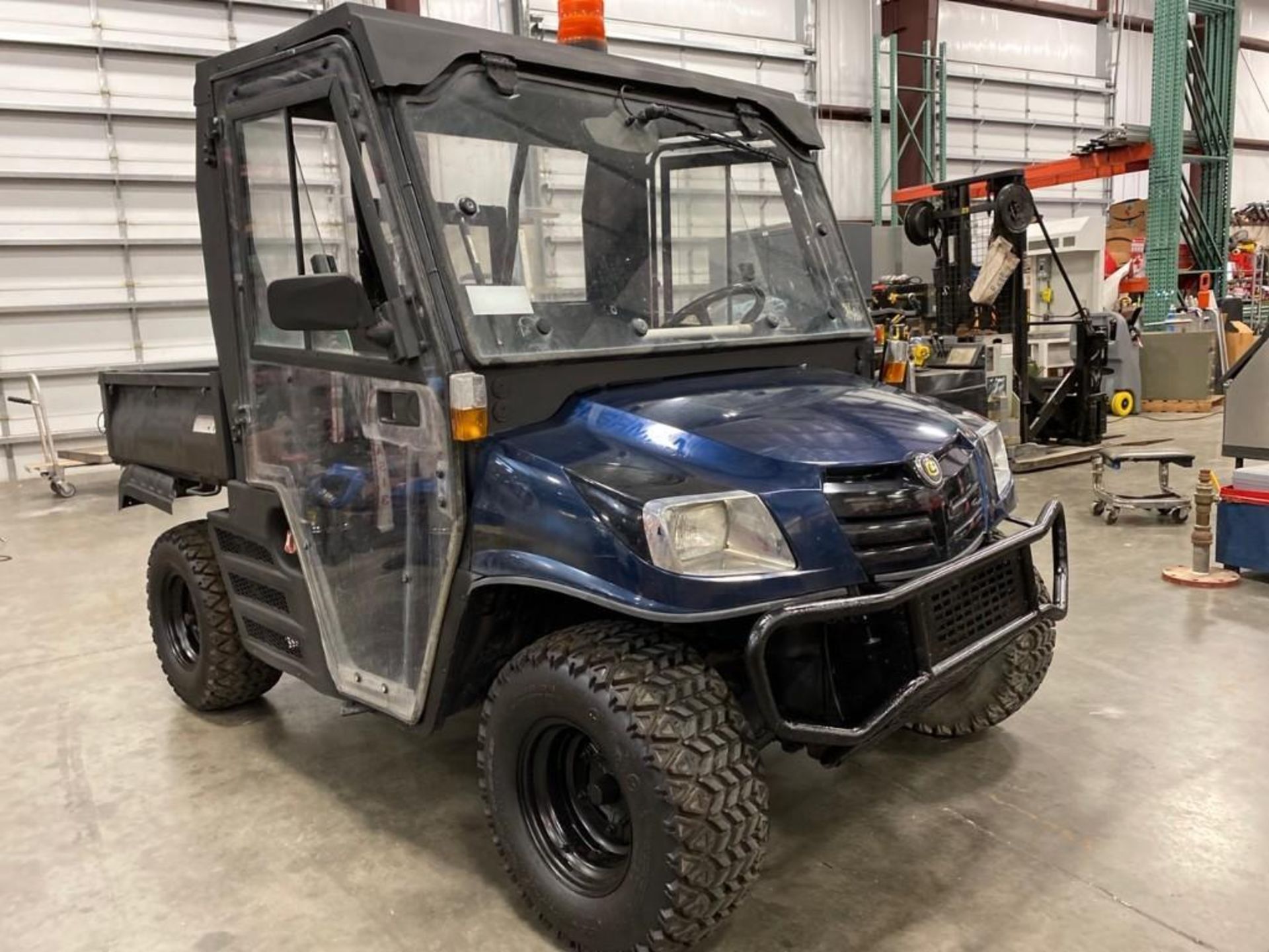 2013 CUSHMAN UTV, ENCLOSED CAB, GAS POWERED, RUNS AND DRIVES, DUMP BED