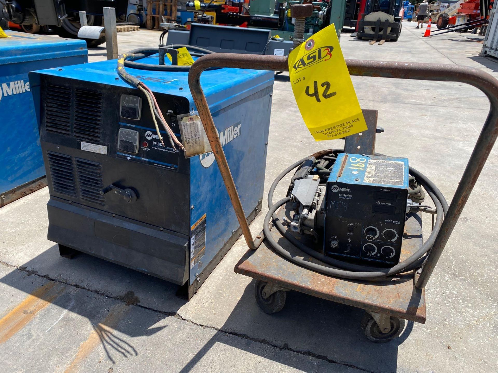 MILLER CP-302 ELECTRIC WELDER WITH MILLER 60 SERIES 24V WIRE FEEDER AND CABLES/CORDS