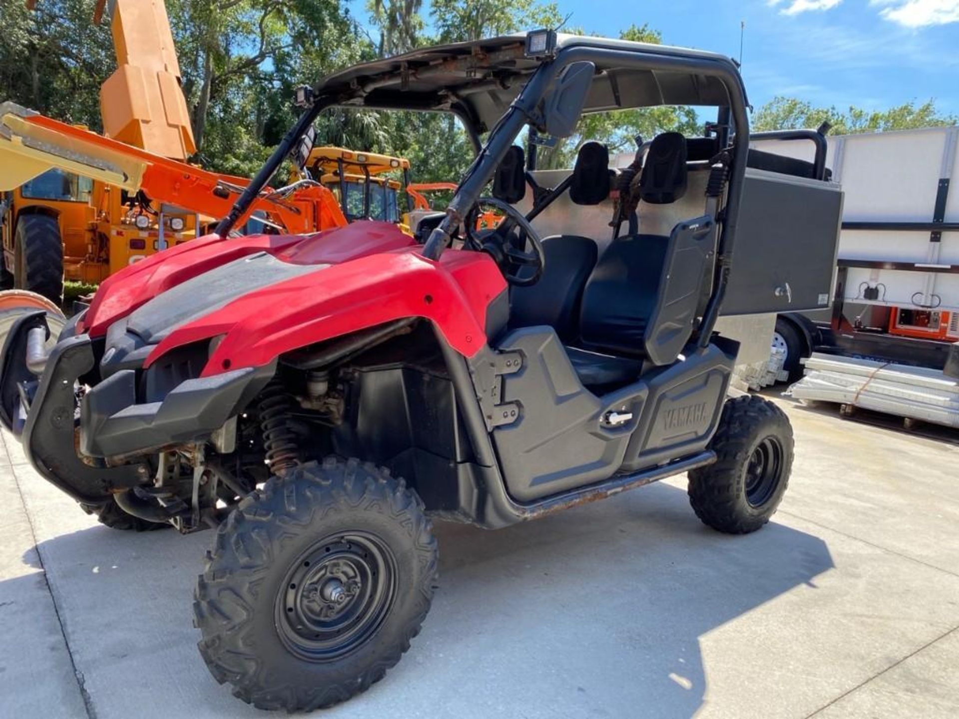 YAMAHA UTV WITH TOOL/STORAGE BIN, HAS RUST ON UNDER CARRIAGE AND FRAME, RUNS AND OPERATES