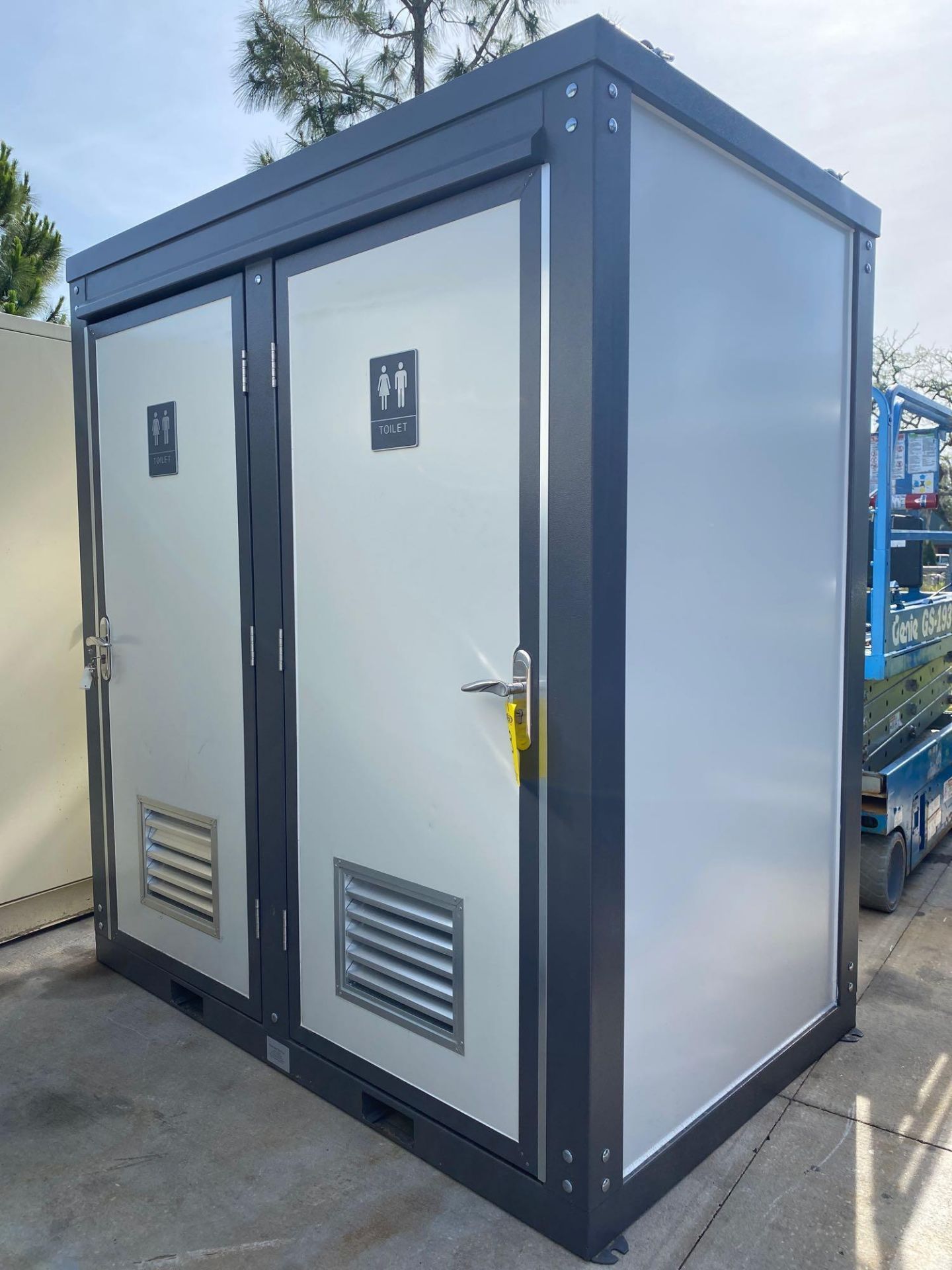 NEW/UNUSED PORTABLE BATHROOM UNIT, TWO STALLS, PLUMBING AND ELECTRIC HOOKUP, 81" WIDE 90" TALL 51" D