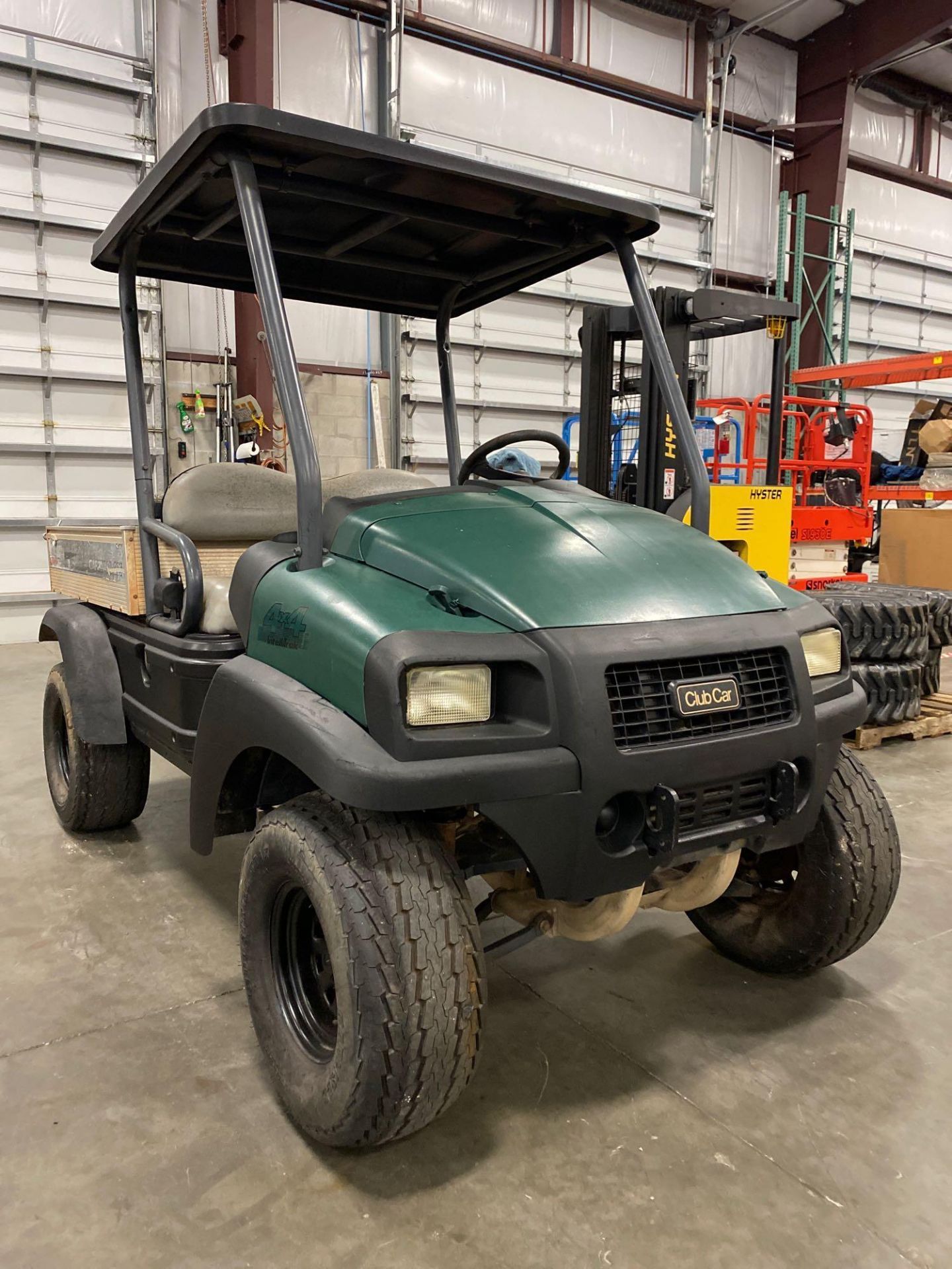 CLUBCAR GAS POWERED UTILITY CART, 4x4, DUMP BED, RUNS AND DRIVES