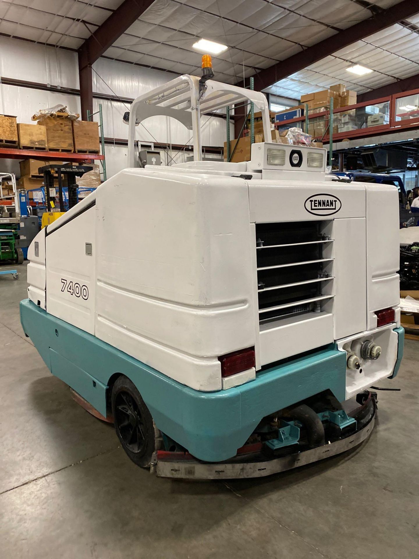 TENNANT 7400 STREET SWEEPER, APPROX. 887 HOURS SHOWING, RUNS AND