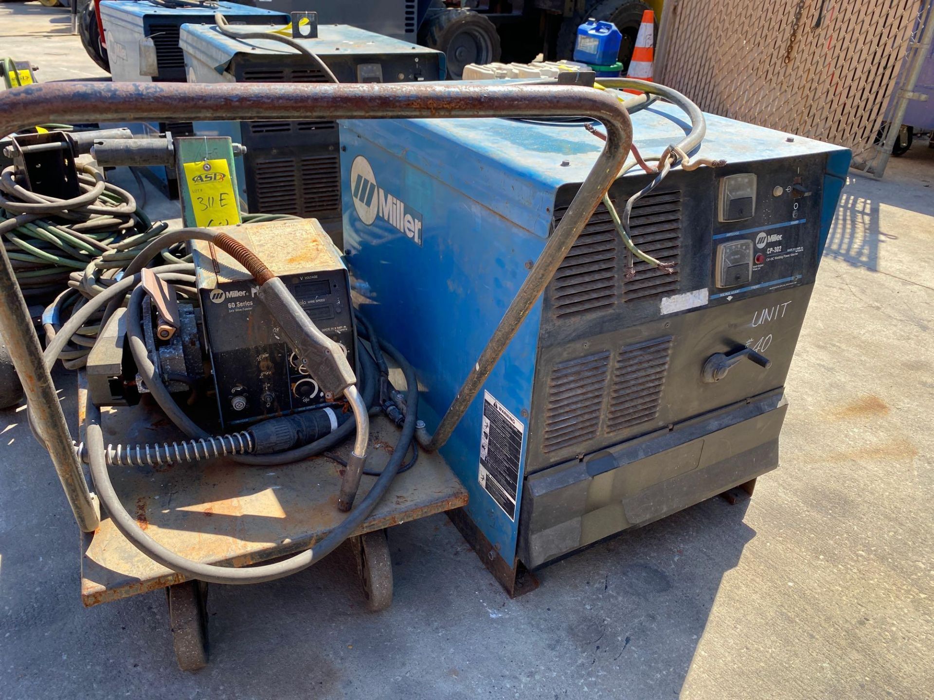 MILLER CP-302 WELDER WITH MILLER 24V WIRE FEEDER