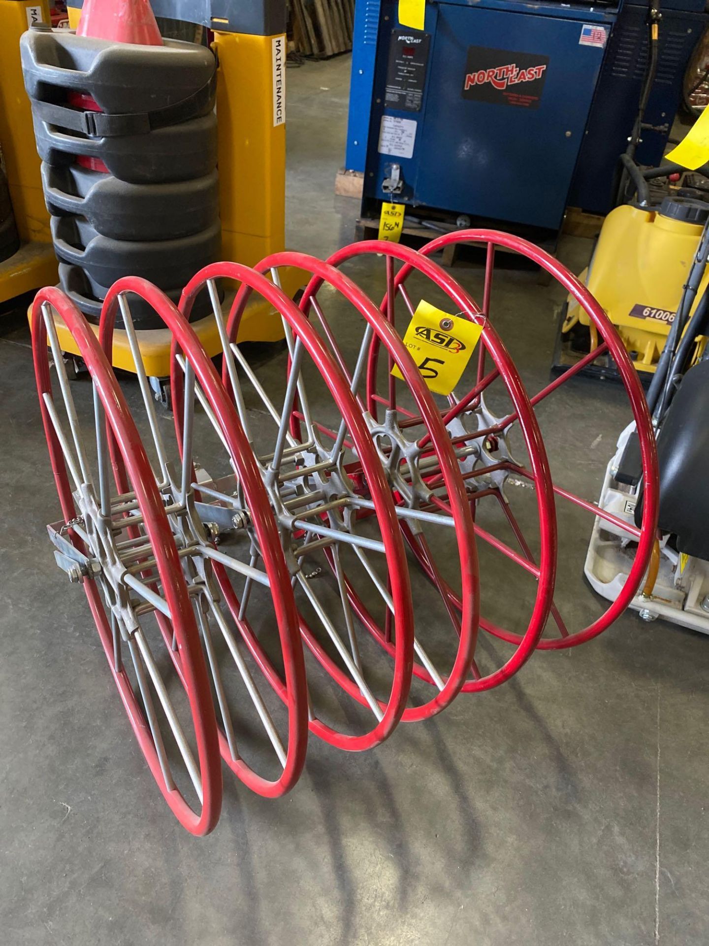 THREE UNUSED FIRE HOSE REELS