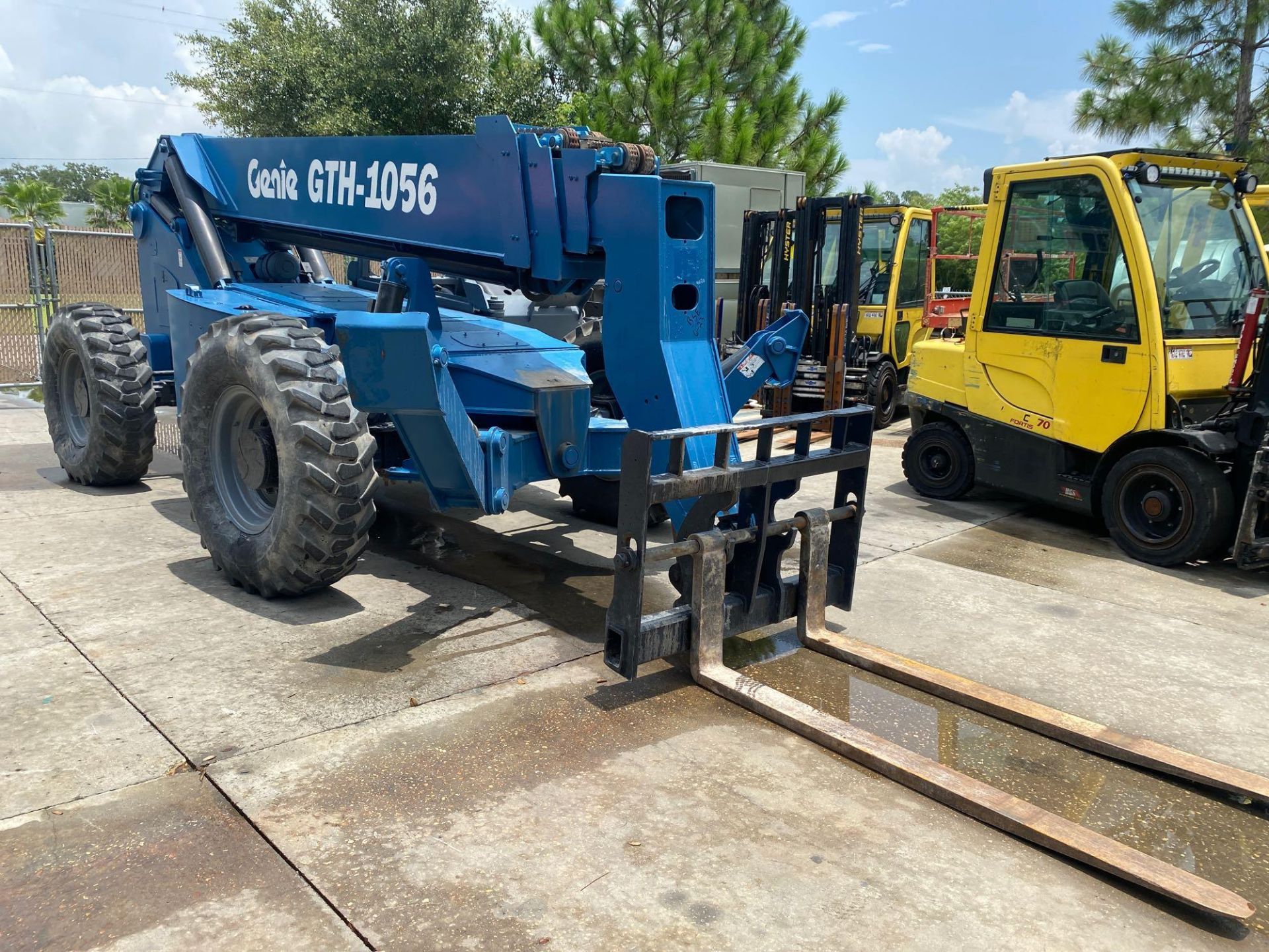 GENIE GTH-1056 , 10,000LB CAPACITY, OUTRIGGERS, 56' TELESCOPIC REACH, DIESEL, RUNS AND OPERATES, HOU