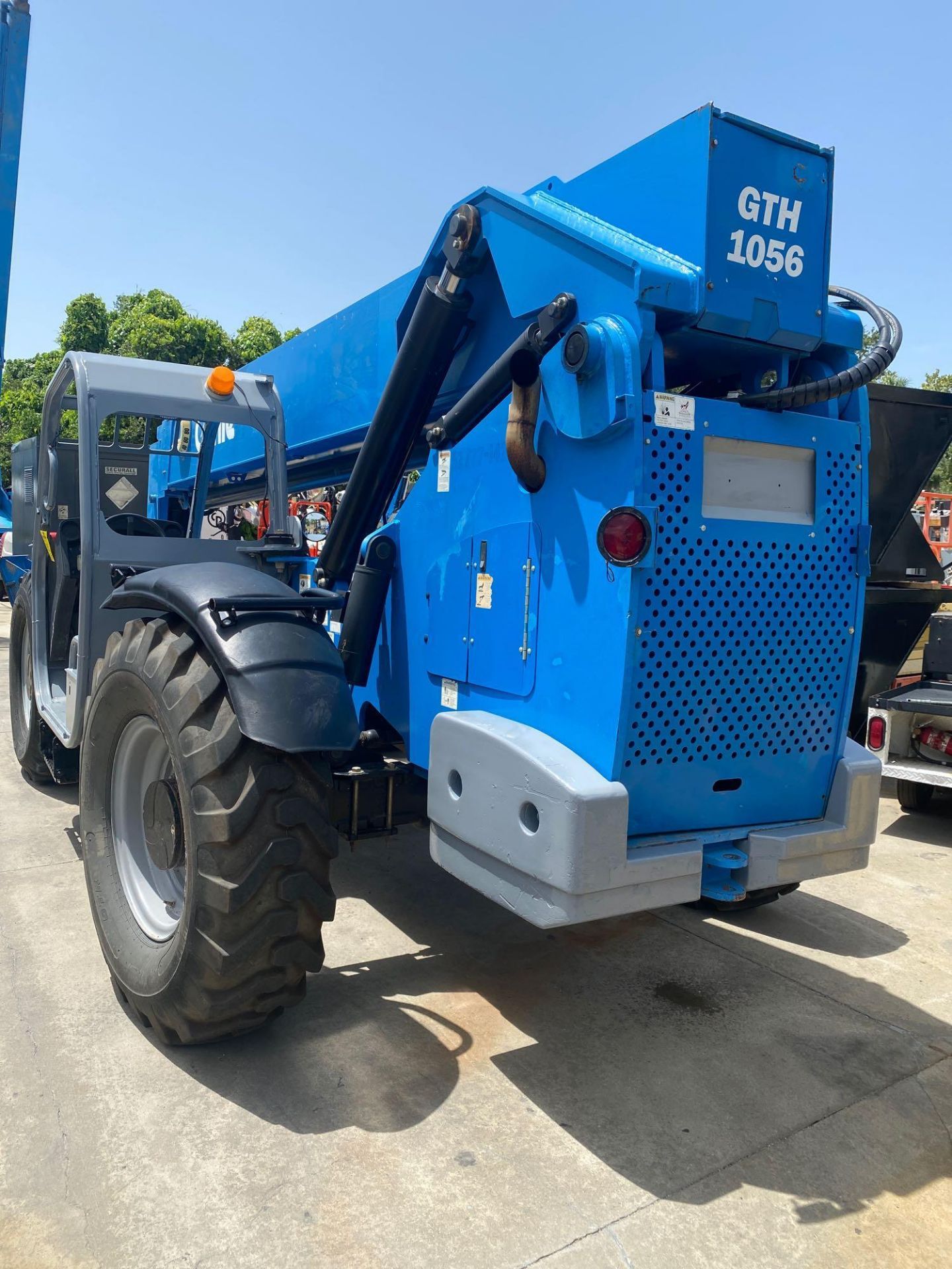 2012 GENIE GTH-1056, DIESEL TELEHANDLER, 10,000LB CAPACITY, FOAM FILLED TIRES, OUTRIGGERS, RUNS AND - Image 6 of 15