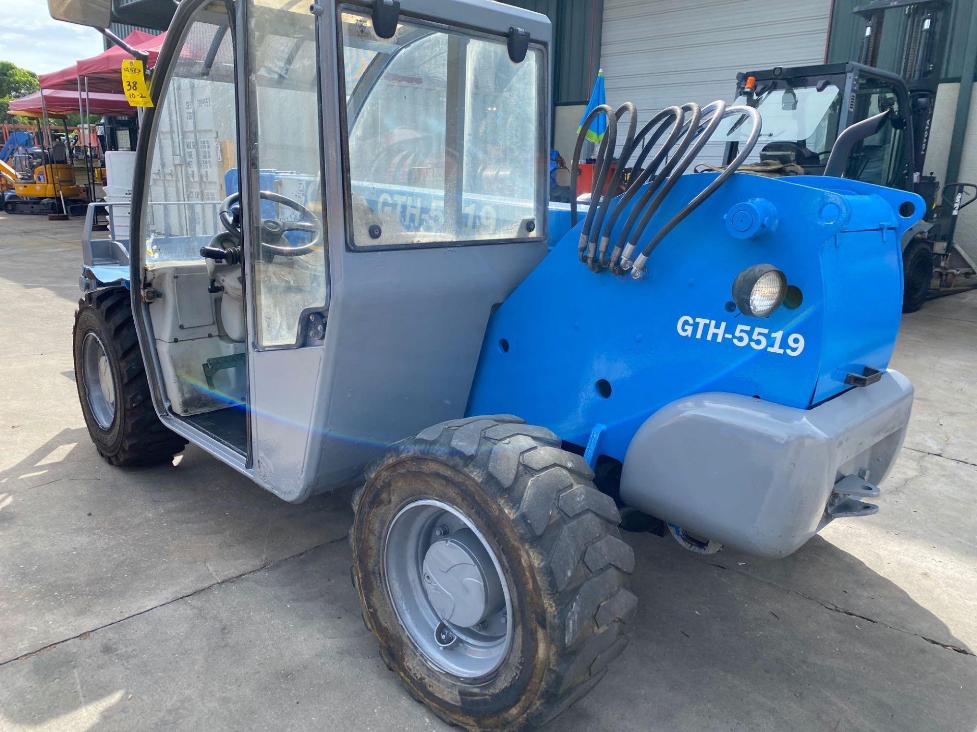 GENIE GTH-5519 MINI TELESCOPIC FORKLIFT, APPROX 5,500LB CAPACITY, DIESEL POWERED, 19’REACH, CRAB STE - Image 3 of 10