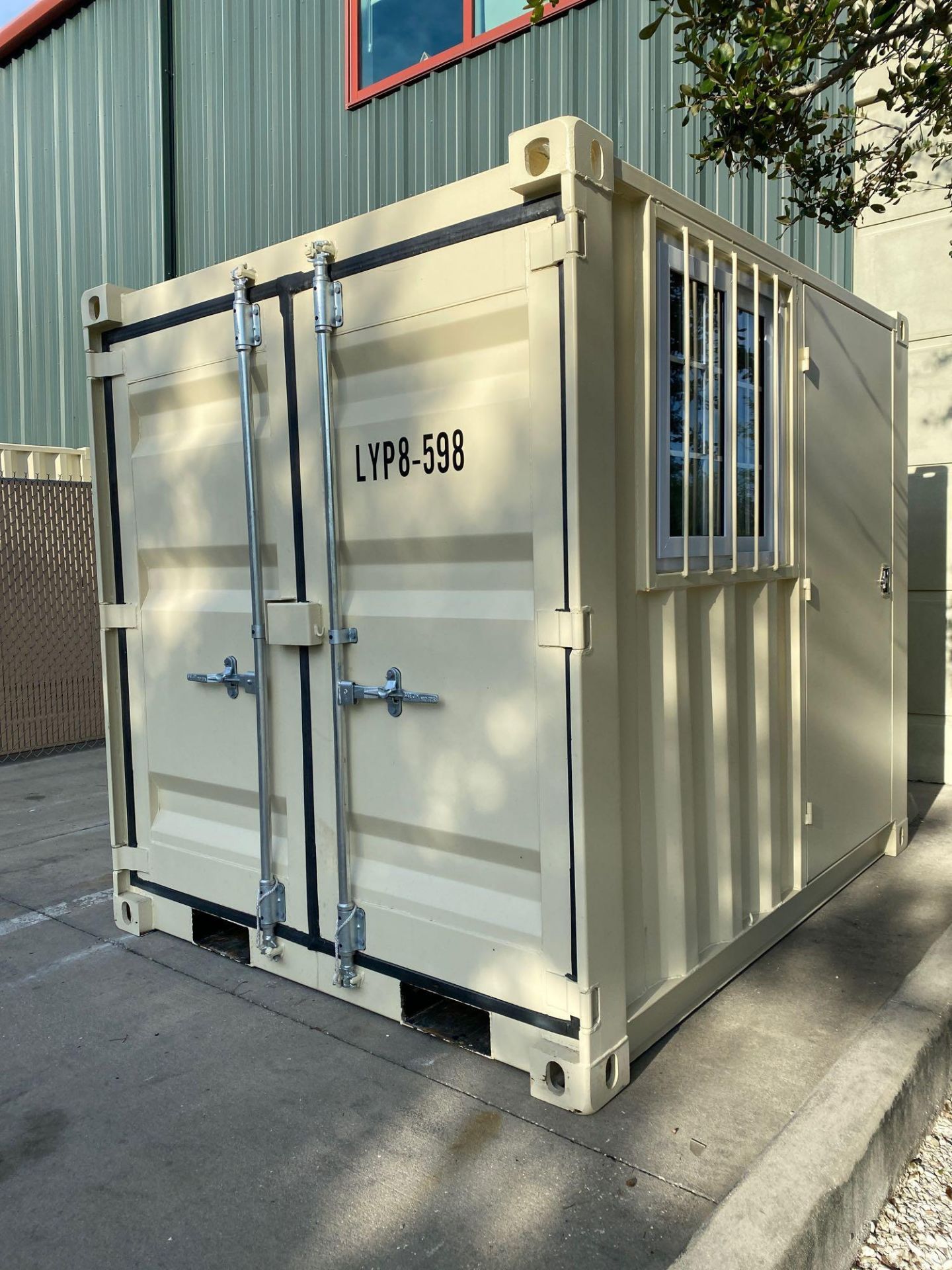 UNUSED 8' CONTAINER/PORTABLE OFFICE WITH WINDOW AND SIDE DOOR ENTRANCE (LOCKING), FORKLIFT POCKETS