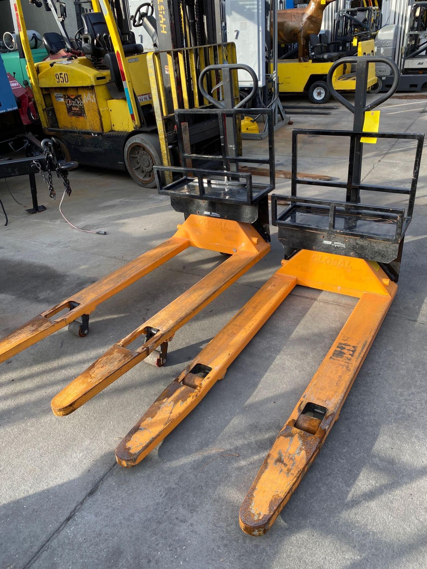 TWO TCI GLOBAL PALLET JACKS