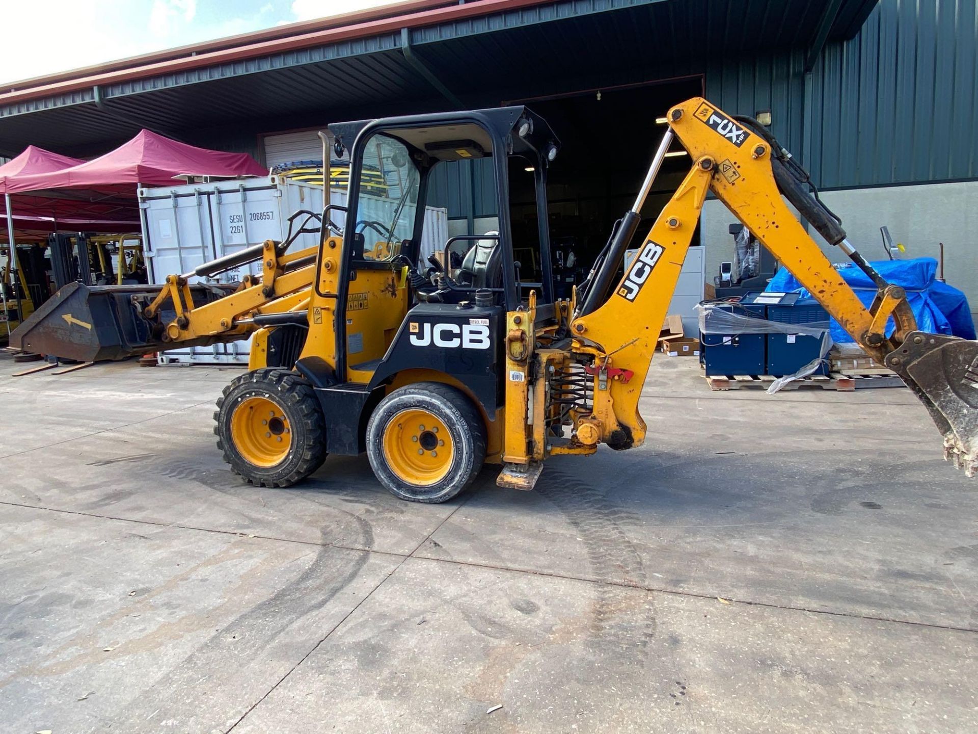 2014 JCB 1CX DIESEL SKID STEER/LOADER WITH 4-IN-1 BUCKET AND JCB BACKHOE, AUX. HYDRAULICS