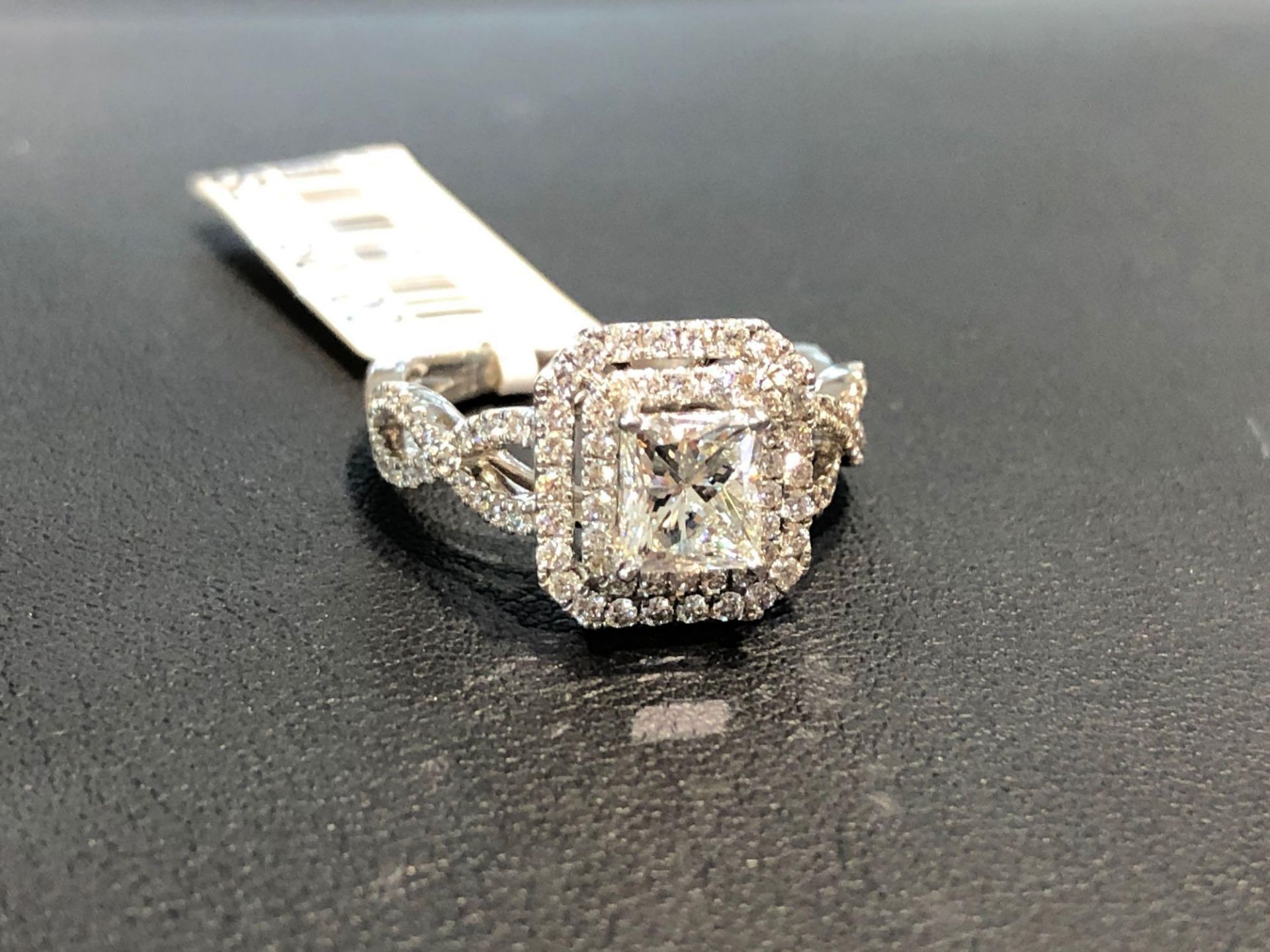BEAUTIFUL 1.05CT PRINCESS CUT CENTER DIAMOND, GIA CERTIFIED J COLOR VS1 CLARITY, WITH .50CT SIDE DIA