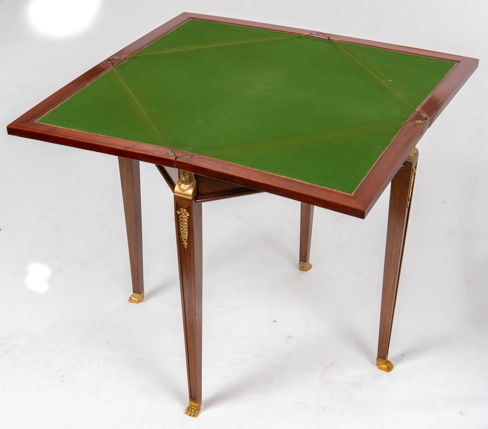 A fine French Empire style mahogany veneered folding playing table with gilt bronze mounts, brass in - Image 9 of 10