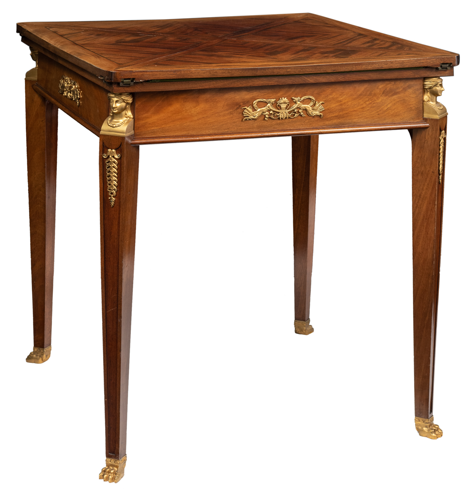 A fine French Empire style mahogany veneered folding playing table with gilt bronze mounts, brass in