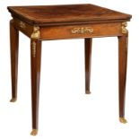 A fine French Empire style mahogany veneered folding playing table with gilt bronze mounts, brass in