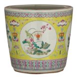 A Chinese lemon green ground famille rose jardiniere, decorated with flowers, fruits and bats, 19thC