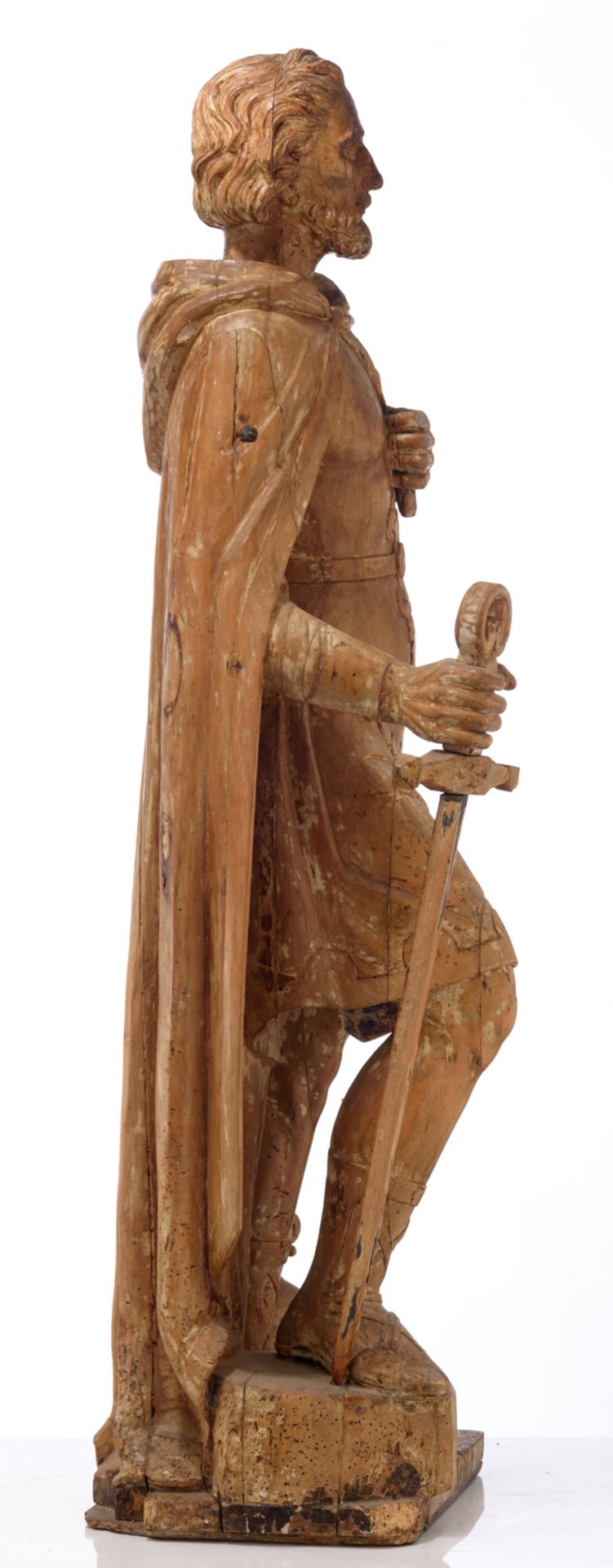 A large limewood sculpture of a Roman warrior, with traces of polychrome paint, 17thC, H 125 cm - Image 4 of 4