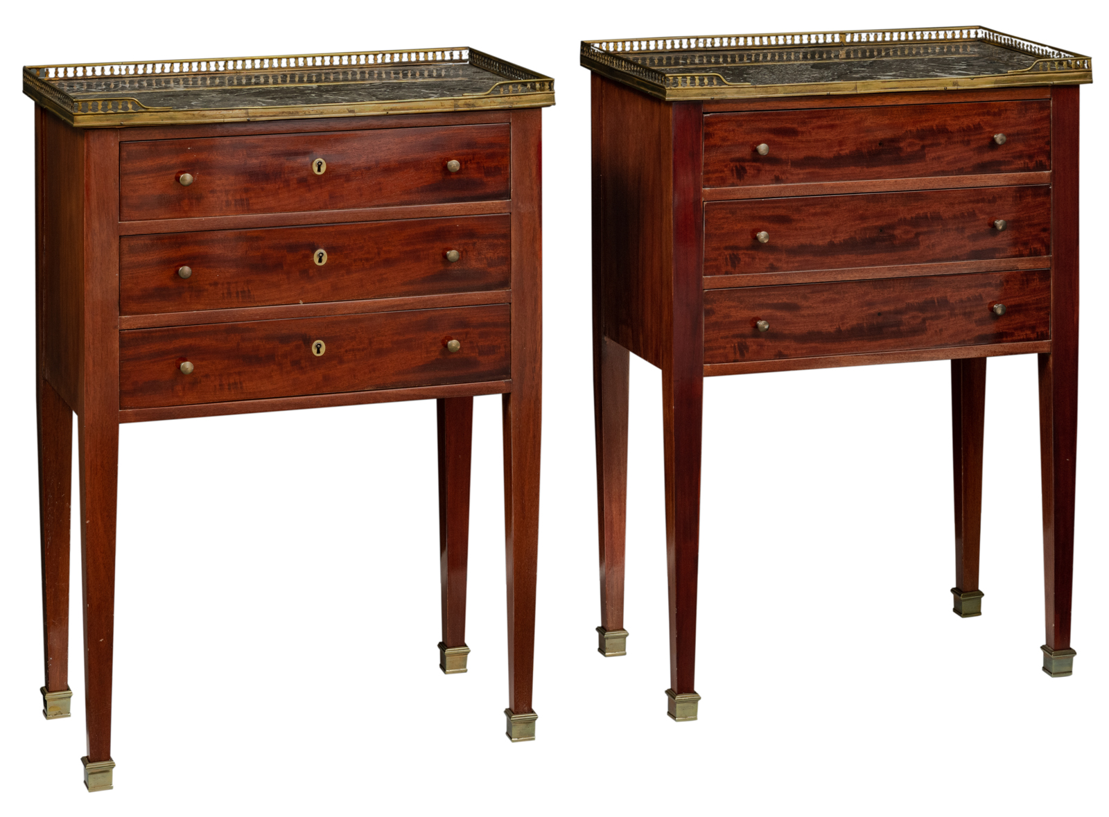 A pair of Neoclassical mahogany veneered side tables, with brass mounts and a gris Ste Anne marble t