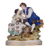 A polychrome painted porcelain group depicting a gallant scene, marked Aelteste Volkstedter Porzella