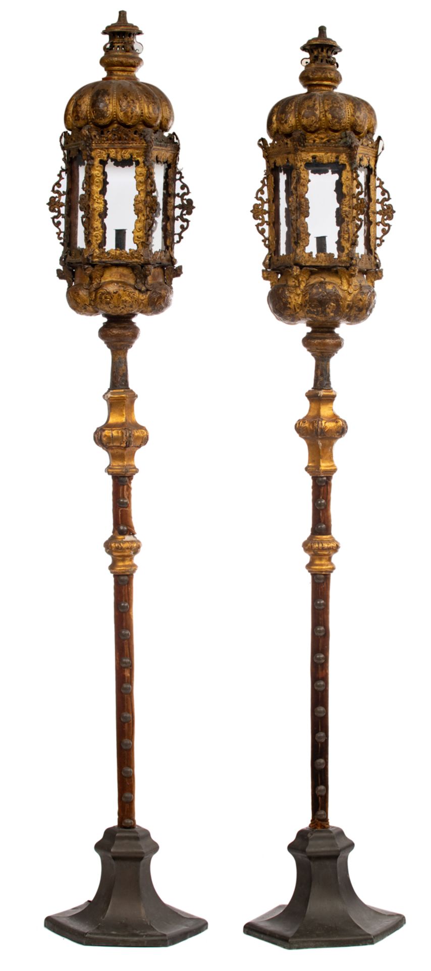 An imposing pair of Italian Baroque gilt bronze lanterns, decorated with angel heads, on two matchin