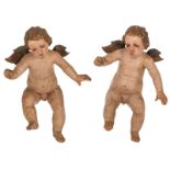 Two putti angels in pinewood with polychrome paint, late 18thc/19thC, H 26 cm