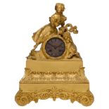 A gilt-bronze mantle clock with a rural scene on top, the dial signed 'Lebrun à ?', second half of t