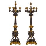 A pair of Renaissance Revival patinated and gilt bronze candlesticks, 19thC, H 69,5 cm