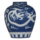 A Chinese blue ground and white dragon decorated vase, with a Xuande mark, H 17,5 cm