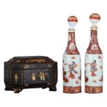 A Chinese lacquered and gilt decorated tea caddy; added two Japanese polychrome bottles and stoppers