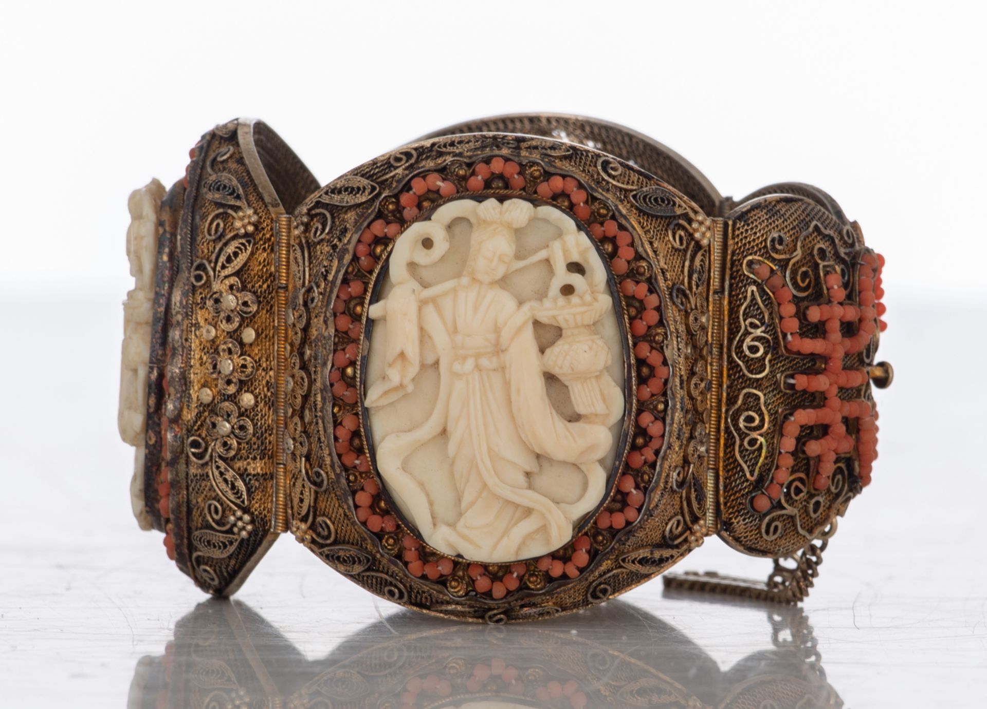 An Oriental filigree gilt silver bracelet set with basso-relievo cut ivory plaques surrounded by cor - Image 3 of 8