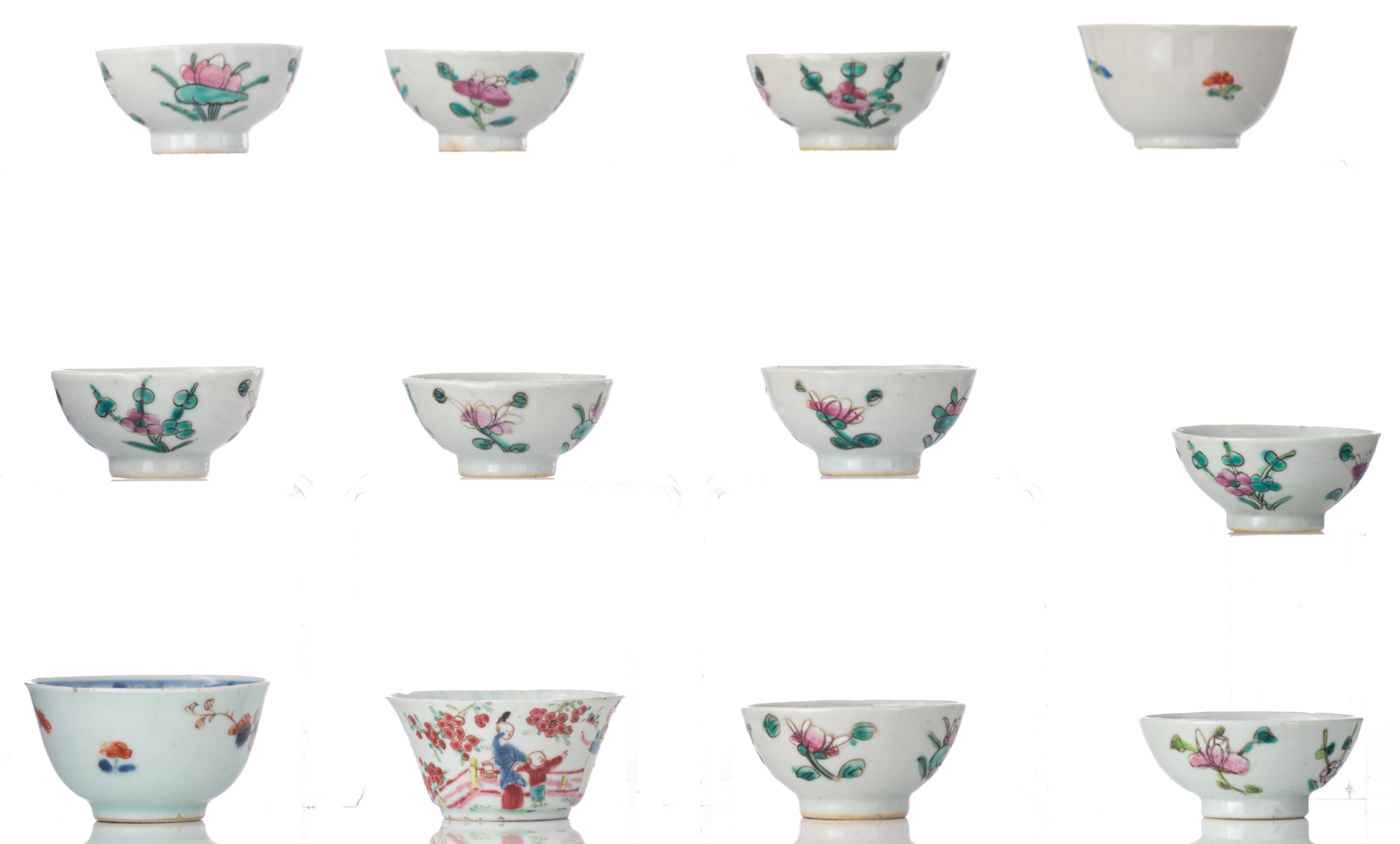 Various famille rose, blue and white, polychrome and Imari cups and saucers, two teapots and covers, - Image 16 of 25