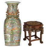 A large Chinese Canton vase, decorated with animated scenes, kylins, flowers, butterflies, birds, ba