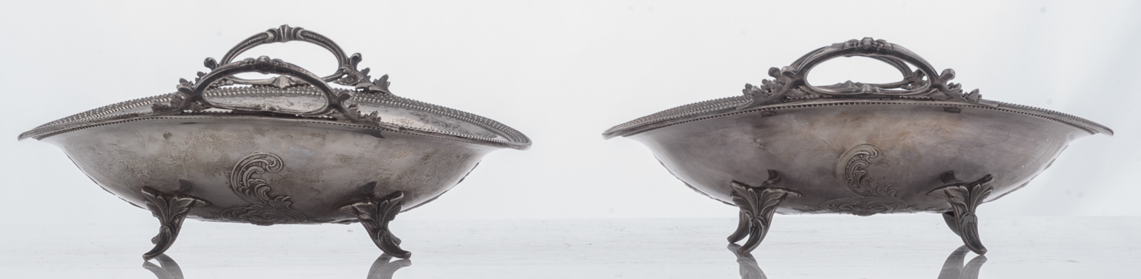 A pair of 19thC Rococo Revival silver vegetable dishes, Austro Hungarian, 13 lothige 812/000, with a - Image 4 of 11