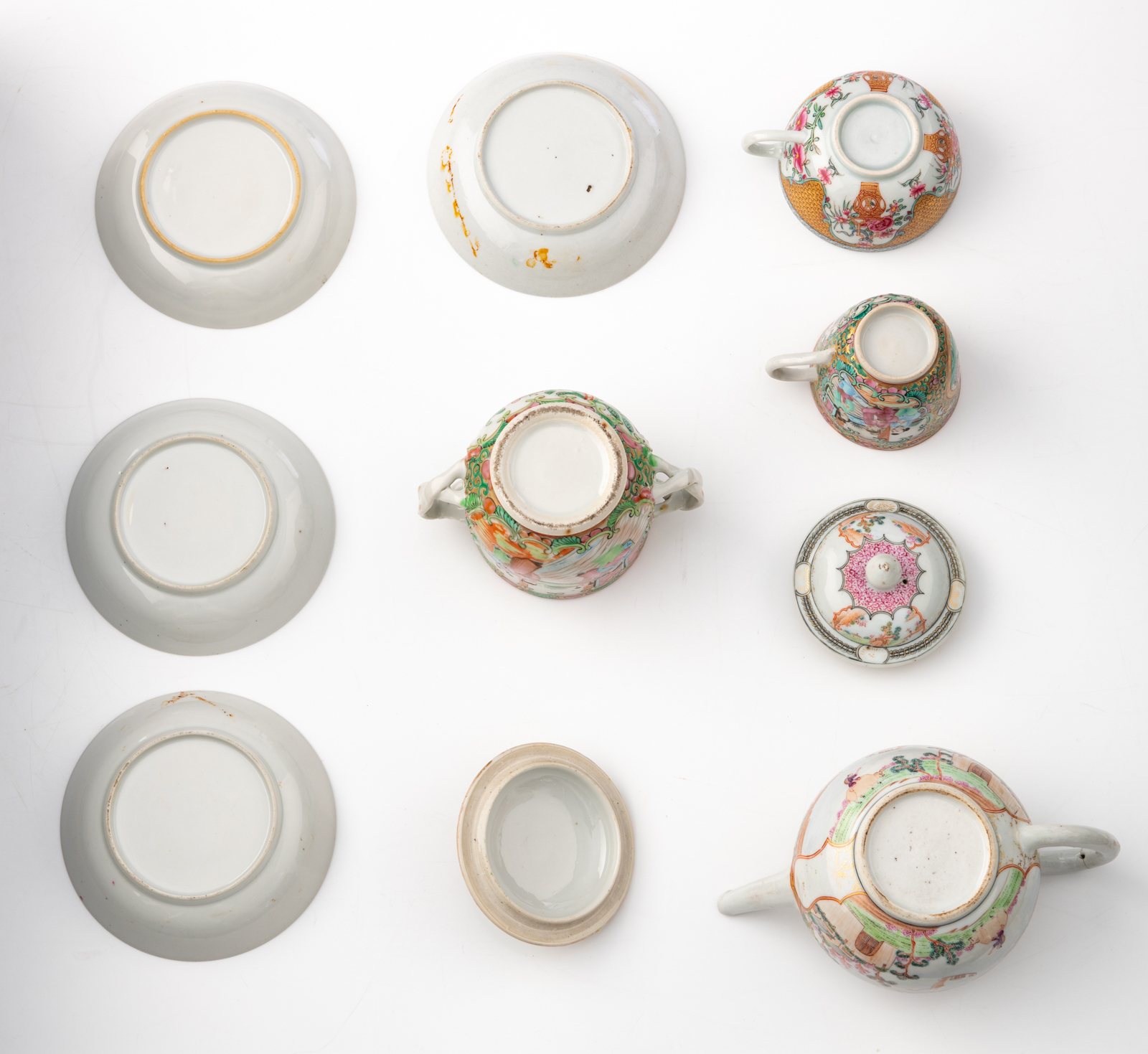 Various famille rose, blue and white, polychrome and Imari cups and saucers, two teapots and covers, - Image 21 of 25