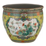 A Chinese yellow ground polychrome floral decorated fish bowl, the roundels with flowers, birds and